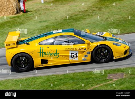 Harrods Mclaren F1 Gtr Mclaren F1 Racing Car Driving Up The Hill Climb