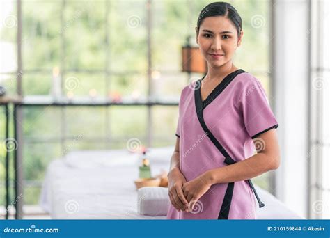 The Massage Therapist Makes A Belly Massage To A Pregnant Woman Stock