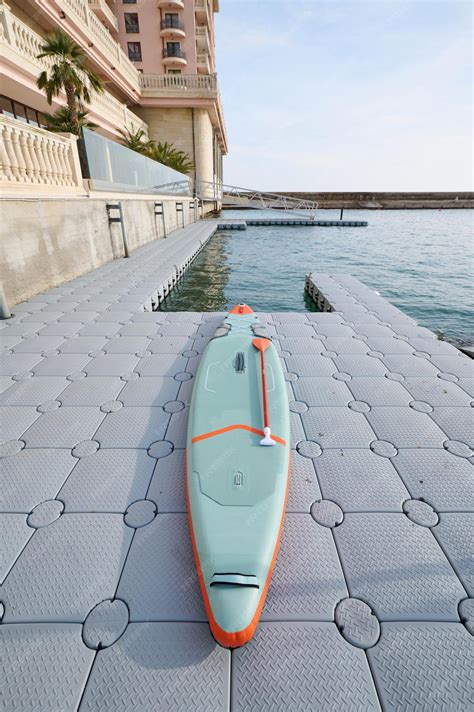 Premium Photo | Sup board on a modular floating docks system in the sea