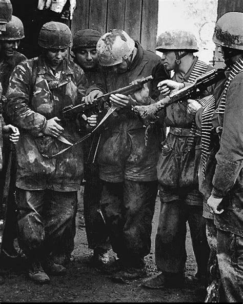 German Fallshirmjager Troops Examine A Captured Thompson M A