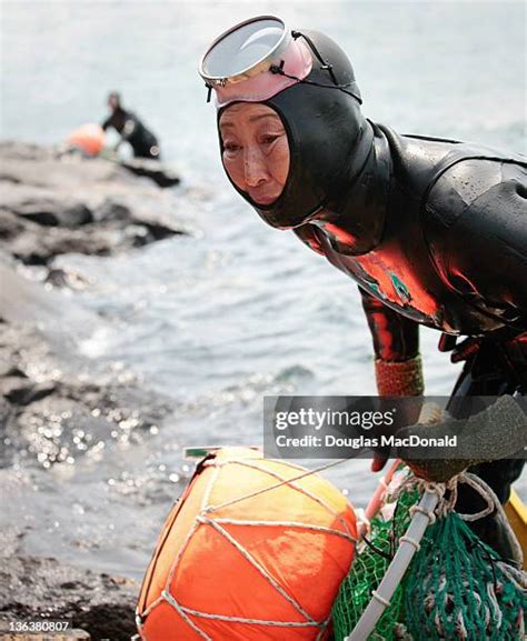 52 Haenyeo Sea Women In Jeju Stock Photos, High-Res Pictures, and ...