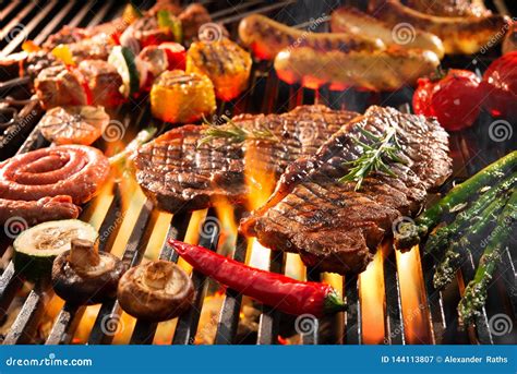 Delicious Grilled Meat With Vegetables Sizzling Over The Coals On Barbecue Stock Image Image