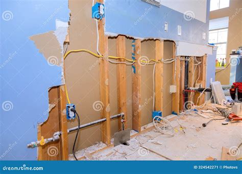 Plasterboard In Kitchen Of House Is Being Replaced As Part Of A Repair