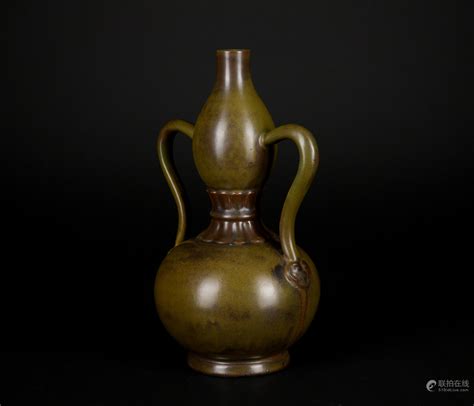 Bidlive A Tea Dust Glazed Gourd Shaped Vase