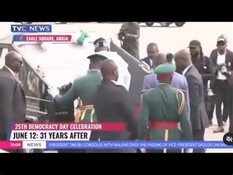 President Bola Tinubu Falls While Climbing A Parade Vehicle For