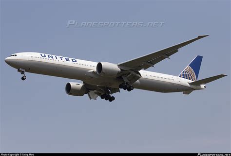 N2142U United Airlines Boeing 777 322ER Photo By Lixing Moo ID