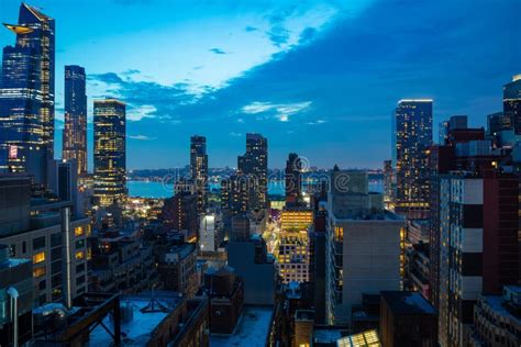 Aerial View Of Manhattan Skyscrapers Lights New York City Blue Sky In