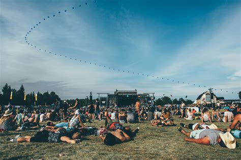 Photo Of People Laying On Grass · Free Stock Photo