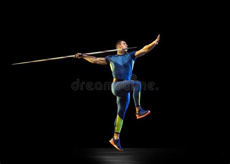 Male Athlete Practicing In Throwing Javelin Isolated On White Studio