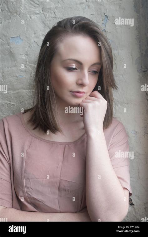 Pensive Young Woman Looking Away Stock Photo Alamy