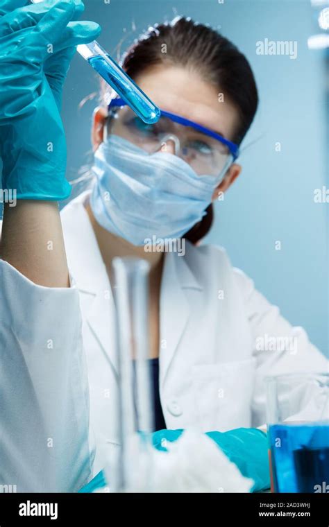 Lab Assistant Experiments With Reagents Stock Photo Alamy