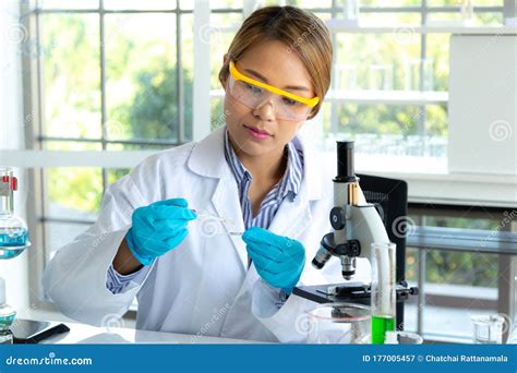 Woman Scientists Researching In Laboratory Professional Science Focus