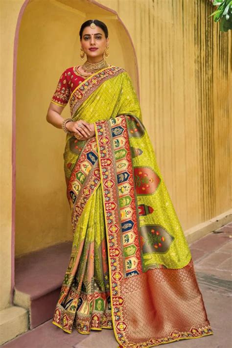 Pure Dola Silk Traditional Saree In Light Green Ucchal Fashion