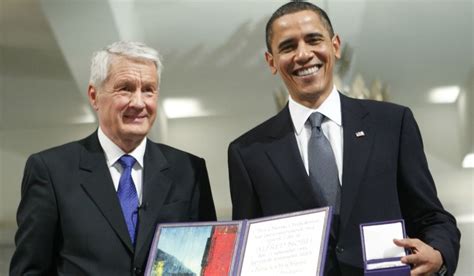 US President and Nobel Peace Prize laureate Barack Obama, right recieves his medal and diploma ...