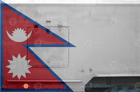 Nepal flag depicted on side part of military armored truck closeup ...