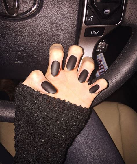 Matte black almond shaped nails | Black nails, Cruise nails, Trendy nails