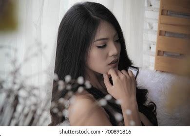 Nude Women Put Underwear On Bed ภาพสตอก Shutterstock