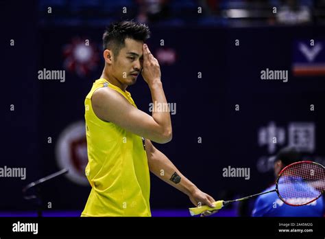 Chinese Professional Badminton Player Lin Dan Competes Against Japanese