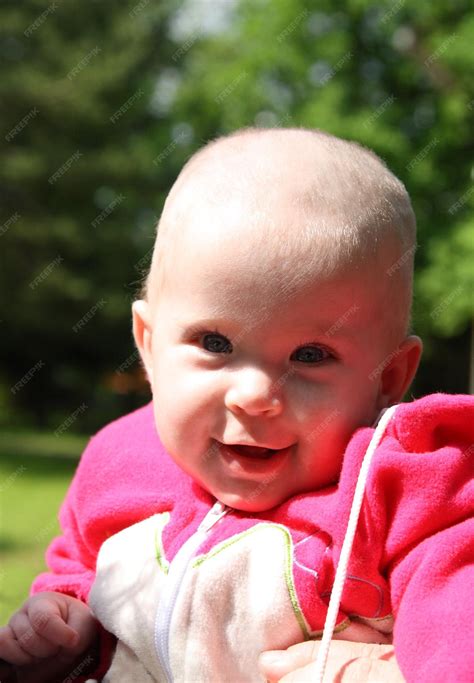 premium photo happy smiling baby outdoors
