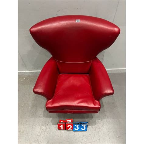 Mid Century Red Leather Wing Back Swivels Chair