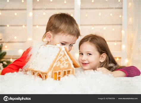 Adorable Kids Playing Gingerbread House Beautiful Living Room Lights Christmas Stock Photo by ...