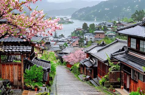Scenic Hilltop Japanese Village with Cherry Blossoms in Spring Rain ...