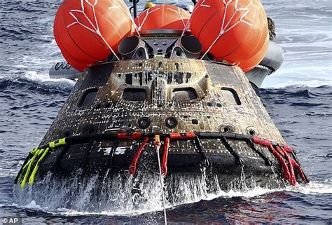 NASA Photos Show Incredible Moment Orion Splashed Back Down To Earth