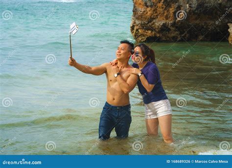 Summer Holidays Lifestyle Portrait Of Young Happy And Playful Asian