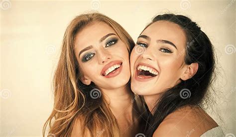 Lovely Girls Are Smiling Two Young Girlfriends Having Fun Stock Image