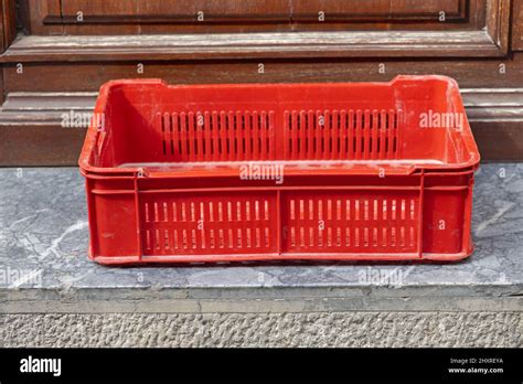 One Empty Red Plastic Crate For Produce Delivery Stock Photo Alamy