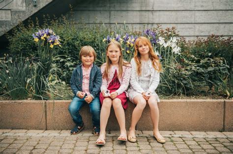 3 Funny Kids Playing Outdoors Stock Image - Image of joyful, elementary: 139871509