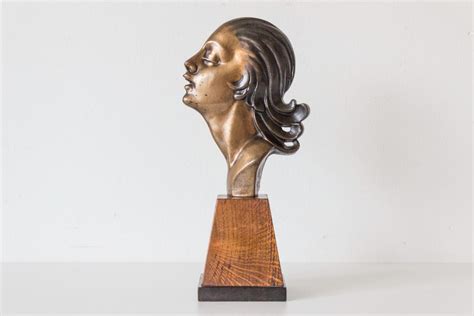 art deco bronze bust streamlined female head  wood base signed