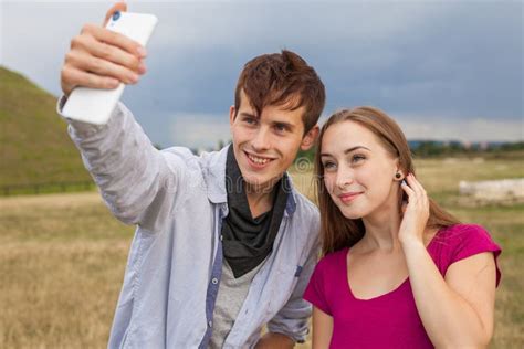 Two Friends With Mobile Phone Taking Selfies Summer Time Stock Image