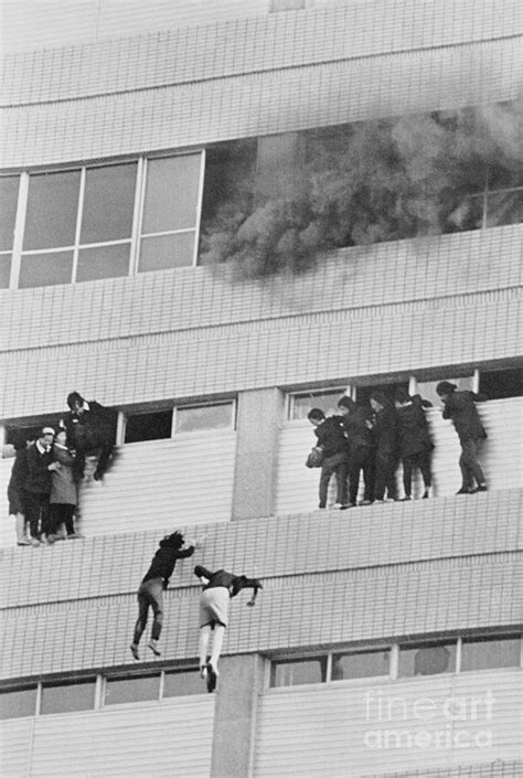 Women Jumping Off Burning Building By Bettmann