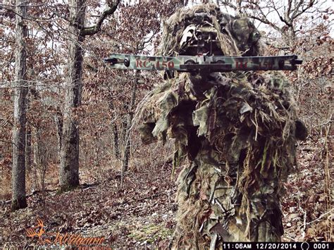 Ghillie Suit In Action While Bowhunting Camouflage Suit Ghillie