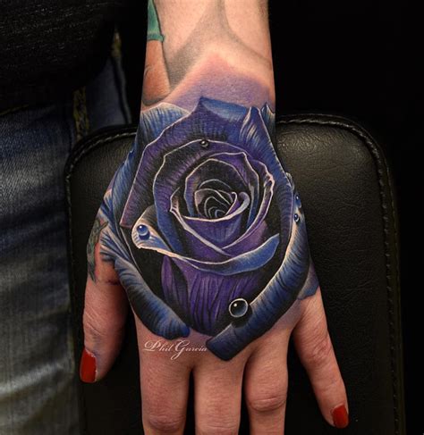 Rose Womans Hand Tattoo