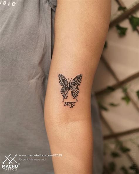 Butterfly Tattoo With Fingerprints Design Inked By Machu Tattoos