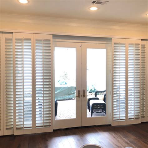 plantation shutters  sliding glass doors enhance home style  privacy