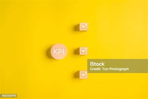 Kpi Key Performance Indicator Businessman Holding Wooden Cube With Kpi