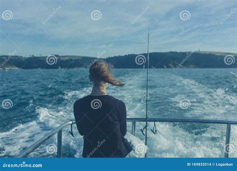 Woman Fishing from Boat in Summer Stock Photo - Image of daylight, fashion: 169833514