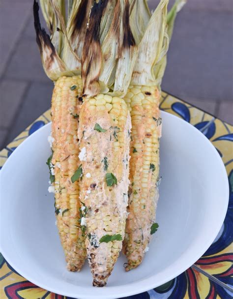 Mexican Street Corn With Two Spoons