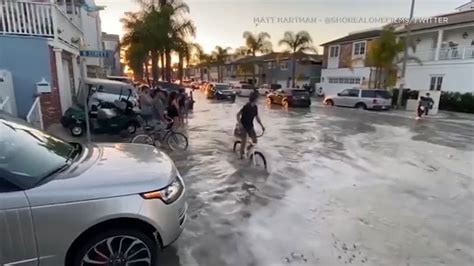 Newport Beach Streets Flooded With Water After High Surf Advisory