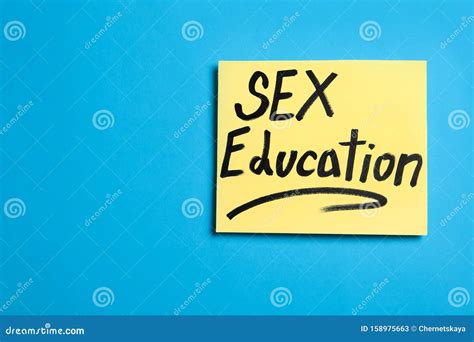 Note With Phrase SEX EDUCATION On Blue Background Top View Stock