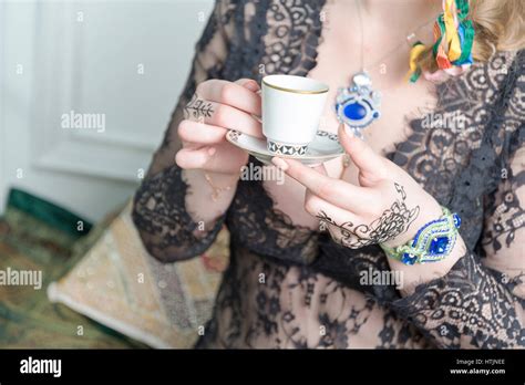 Female Hands Hold A Cup Of Coffee At Breakfast Stock Photo Alamy