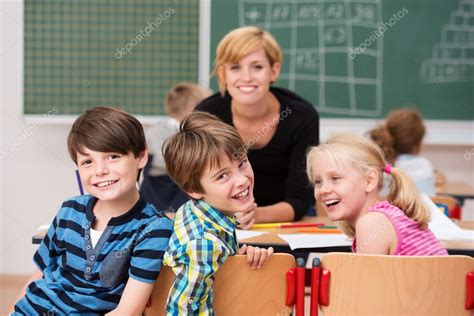 Three Laughing Happy School Children — Stock Photo © Racorn 51325543