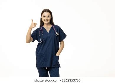 Smiling Professional Doctor Medical Uniform Shows Stock Photo 2262353765 | Shutterstock