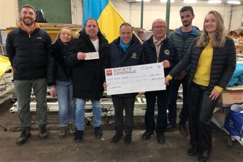 Pont L Ev Que Le Lions Club Remet Un Ch Que L Association Goodwill