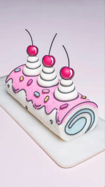 A Cake With Pink Icing And Sprinkles On It