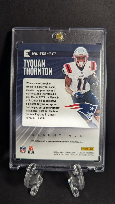 Tyquan Thornton 2022 Panini Chronicles Essentials 199 Rookie Auto RC