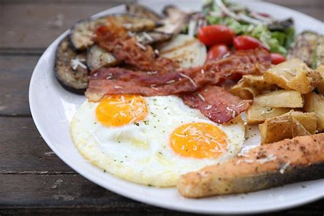 Eggs Bacon Sausage And Salad A Classic American Breakfast Photo